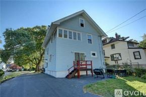 Irondequoit house for rent - A house with a blue exterior is for sale.