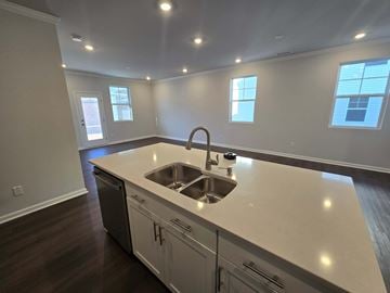 Morrisville house for rent - A kitchen with a sink and cabinets.