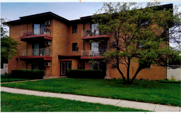 Westmont apartment for rent - A brown building with a tree in front of it.