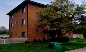 Westmont apartment for rent - A brown building with a green box in front of it.