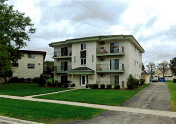 Darien apartment for rent - Apartment building with a green lawn in front.