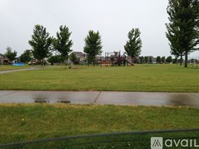 North Mankato townhouse for rent - A park with a playground and trees.