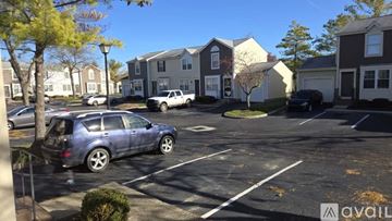 Hilliard condo for rent - A living room with a grey couch and a television.