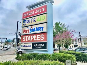 San Diego house for rent - A sign for Trader Joe's is displayed in front of a building.