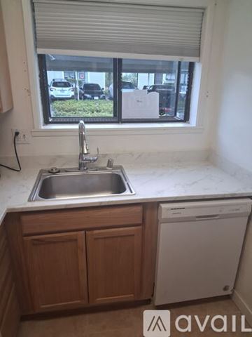 Benicia apartment for rent - A kitchen with a sink and a window.