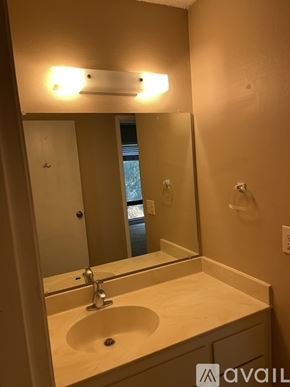 Benicia apartment for rent - A bathroom with a sink and mirror.