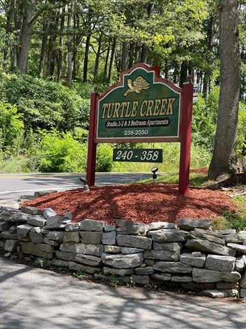 State College apartment for rent - A sign for Turley Creek Studios, 14 & Bedroom Apartments with a phone number 238-2550.