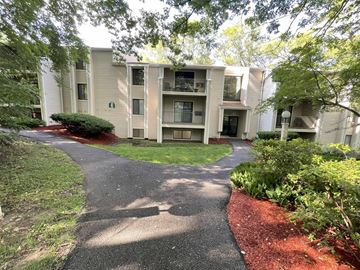 State College apartment for rent - Apartment complex with a walkway in front.