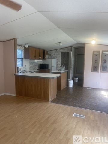 Montgomery County apartment for rent - A kitchen with wooden floors and a counter.