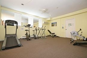 Ottawa apartment for rent - A gym with treadmills, exercise bikes, and other equipment.