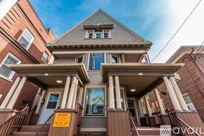 Madison apartment for rent - A house with a "For Rent" sign in front of it.