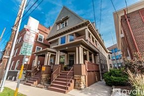 Madison apartment for rent - A house with a sign in front of it that says "PARKING LIMITED TO 2 HOURS BETWEEN 8AM AND 6PM EXCEPT RESIDENTS".