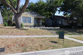Fort Worth house for rent - A house with a yard and a sign that says "For Sale".