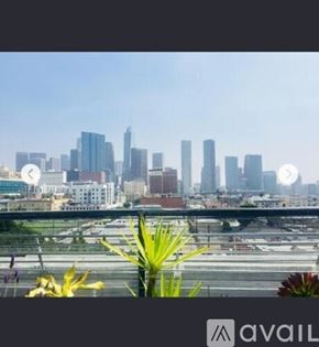 Los Angeles apartment for rent - A city skyline with tall buildings and a clear sky.