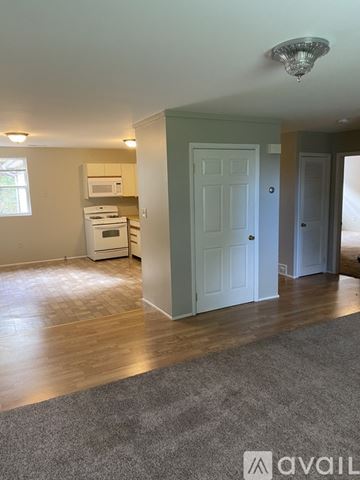 Honesdale townhouse for rent - A kitchen area with a white oven and microwave.
