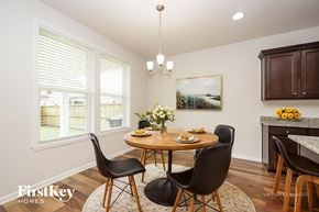 Murfreesboro house for rent - A dining room with a round table and chairs.