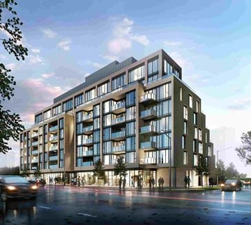 Toronto apartment for rent - A modern multi-story building with large windows and balconies is depicted.