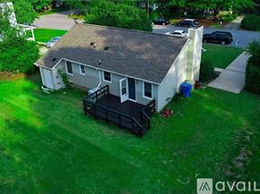 Fuquay Varina house for rent - A house with a garage and a carport is for sale.