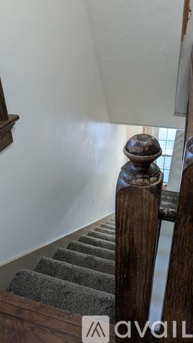 Hanover apartment for rent - A bathroom with a sink, mirror, and window with blinds.