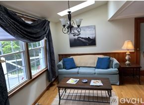Earlysville apartment for rent - A living room with a sofa, chairs, and a table.