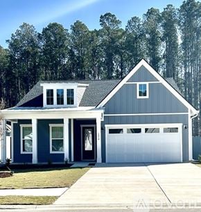 Hardeeville house for rent - A two-story house with a garage and a porch.