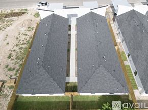 Edinburg townhouse for rent - A bird's eye view of a building with grey roofs.