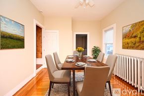 Braintree townhouse for rent - A dining room with a table set for six.