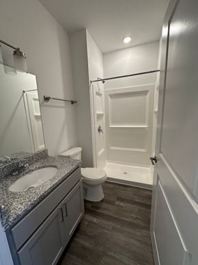 Oak Park apartment for rent - A bathroom with a toilet, sink, and shower.