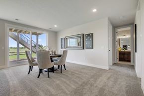 Lake Elmo house for rent - A modern dining room with a table and chairs.