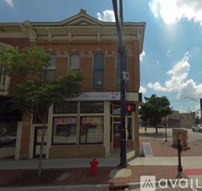 Dekalb apartment for rent - A red fire hydrant is in front of a store.