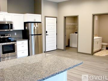 Minneapolis apartment for rent - A kitchen with a granite countertop and stainless steel appliances.