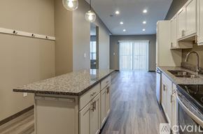 Minneapolis apartment for rent - A laundry room with a washer and dryer.