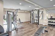 Phoenix apartment for rent - A spacious home gym with a variety of equipment.