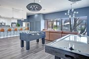 Phoenix apartment for rent - A pool table in a room with a view of the outdoors.