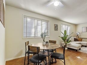 Washington apartment for rent - A dining room with a table and chairs.