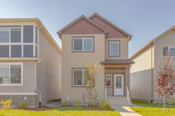 Edmonton apartment for rent - A house with a red roof and a white door is surrounded by other houses.