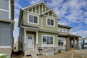 Beaumont apartment for rent - A house under construction with a grey and green exterior.