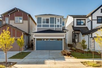 Beaumont apartment for rent - A modern house with a garage door in the center.