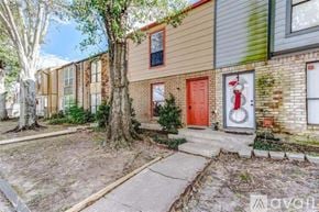 Seabrook house for rent - A house with a red door and a wreath on the door.