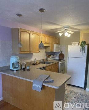 Winthrop apartment for rent - A room with a window and a floor lamp.