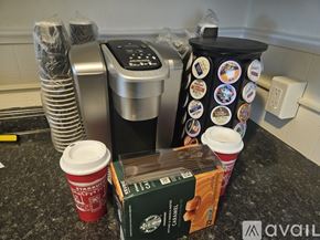 Scranton apartment for rent - A kitchen counter with a Starbucks cup, a box of Starbucks coffee, and a container of cookies.