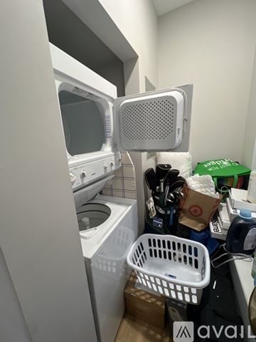 Boston apartment for rent - A small kitchen with a dishwasher and a microwave.