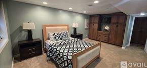 Vine Grove apartment for rent - A bedroom with a bed, nightstands, and a dresser.