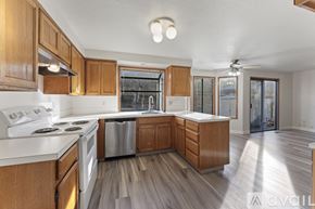Beaverton house for rent - A spacious living room with a staircase leading to the upper floor.