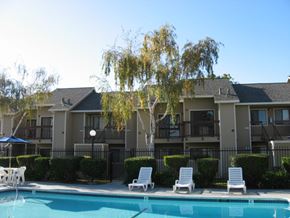 Antioch apartment for rent - A swimming pool in front of apartment buildings.