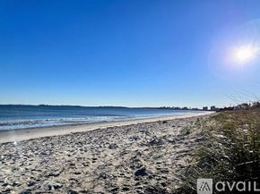 Revere apartment for rent - A beach with a clear blue sky and the sun shining brightly.