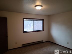 Billings townhouse for rent - A room with a window and a carpeted floor.