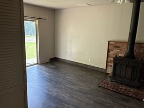 Morgan's Point Resort house for rent - A room with a fireplace and sliding glass doors.