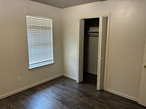 Morgan's Point Resort house for rent - A room with a door and a window with blinds.