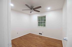 West Springfield house for rent - A room with a ceiling fan and a window.